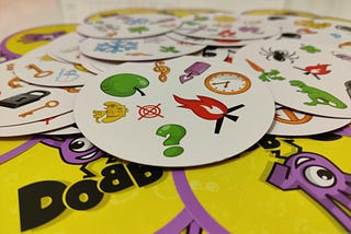 A deck of Dobble cards.