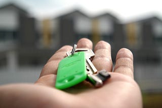 A hand holding keys