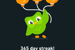 Screenshot of Duolingo’s mascot, Duo the bird, congratulating me for 365 days of using the app