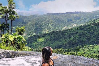 Hiking a trip hike to admire a waterfall and infinity pool, El Yunque National Forest, travel and take photos for instagram