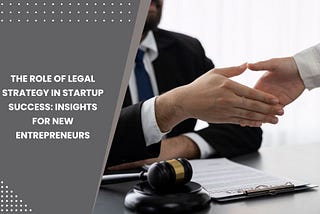 A business owner signing legal documents with a lawyer, symbolizing the importance of legal strategy for startup success.