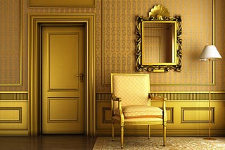 Classic palace interior with armchair mirror and golden molding stock photo (source: istockphoto.com)