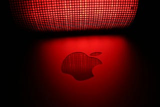 Image of apple’s logo on red
