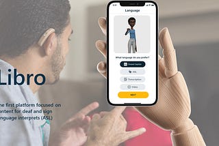 A hand holding a phone with a screen app to select your language.
