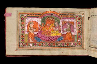 A photographic digitised image showing an illustrated page inside a manuscript from Wellcome Collection (Wellcome MS Indic Alpha 978). The brightly coloured illustration shows two people with a Hindu deity, there is an intricate border of flowers around the figures.