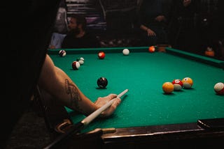 Applying Top Spin to the Cue Ball in Pool