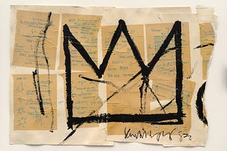 Sketch of a black crown by the artist Basquiat with old pieces of paper attached behind it