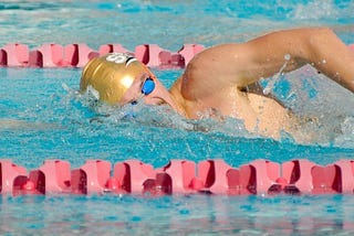 Joel Ax named one of 100 Greatest Men’s Swimmers & Divers