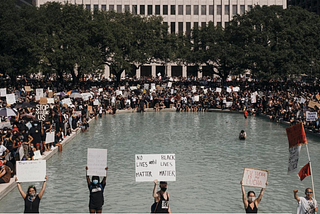 “Rioters” at Houston’s Discovery Green.