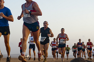 What does investing in the stock market & running a marathon have in common?