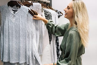 Happy woman shopping for clothes