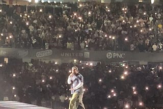 Kendrick Lamar sings at the Grand National Tour.