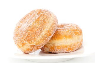 Donuts sitting on a plate