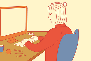 A girl sitting at the computer