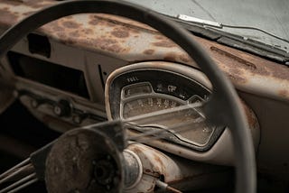 Rusty dashboard of an old car