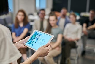 Teacher reading immersive reader in classroom