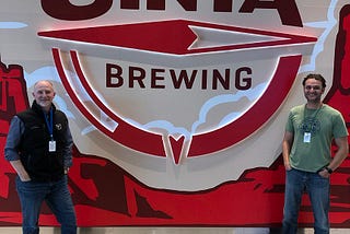 Uinta Brewing President, Jeremy Ragonese (left) and V.P. of Sales, Noah Brown (right) stand outside the Airport Pub.