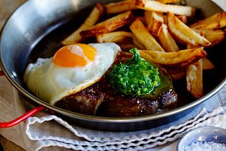 Steak And Egg With Herbed Chilli-Butter — With Chips