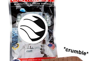 Foil Astronaut Ice Cream sandwich packaging with the product in front. The words crumble and crumbs hover above it.