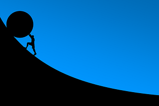Silhouette of someone pushing a boulder up a hill