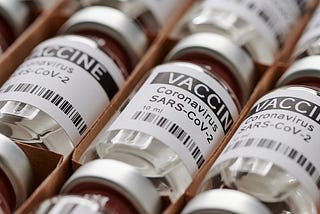 The COVID-19 Vaccine Rollout: Is it going according to plan?