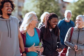 A group of funny and smiling people at the park