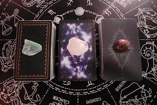 Three tarot piles with crystals arranged on a cloth. Each pile represents a unique soulmate reading — Pile One, Pile Two, and Pile Three — inviting the viewer to intuitively choose.