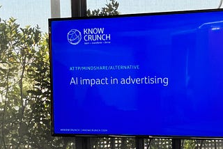 A blue screen with a slide of Knowcrunch that welcomes ATTP, Mindshare, and Alternative to the corporate training focused on AI impact in advertising.