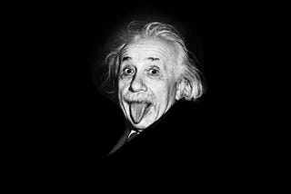 Albert Einstein sticking his tongue at the photographer