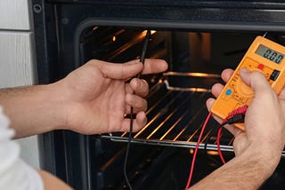 What does an oven repair service include?