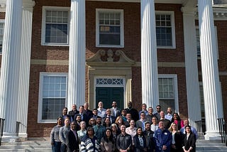 Group photo with my LSI May 2023 cohort in front of the Tuck building