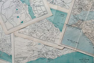 Vintage paper maps of various locations