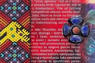 Digital collage: on the far left the stripe of patterns in the shape of a cross; on the right a flower pattern (blue petals, red centre); the background is a book cover (the text in Serbian serves only as an accessory for the digital collage)