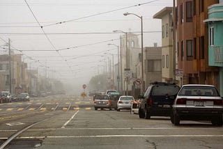 A foggy San Francisco day, looking west on Taraval st. down towards the ocean.