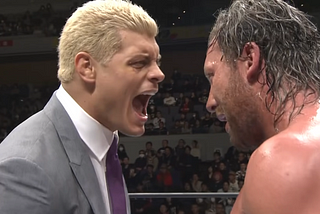 Cody Rhodes confronting Kenny Omega in a NJPW ring.