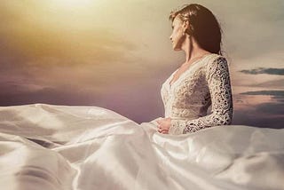 A bride wearing her white wedding dress