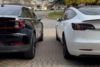 Polestar 2 and Tesla Model 3 parked side-by-side