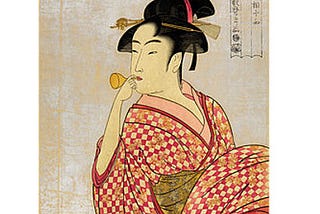 Young lady blowing on a poppin