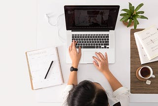 Woman working with laptop.