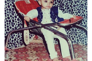 Shaqib Akram, chilling on a chair while making a pose for getting clicked.