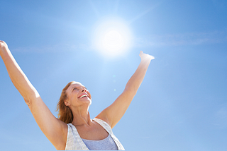 Woman basking in sunlight