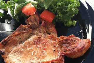 Pork Chop with Kale SaladFilipinos also eat crispy golden browned pork chop.