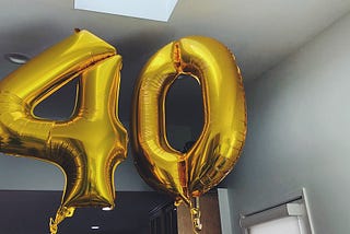 Golden “40” birthday balloons
