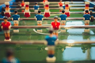 A close-up view of a foosball table.