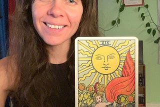 Rozalia Kieliszkiewicz holding the Sun Tarot Card Energy