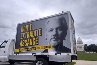 Free Julian Assange mobile advertisement