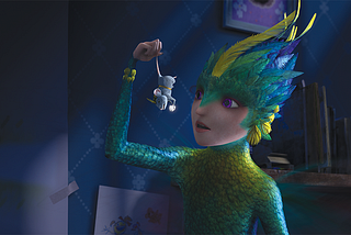 A screenshot of the Tooth Fairy holding up the Tooth Mouse, who is grabbing on to a tooth, from its tail.