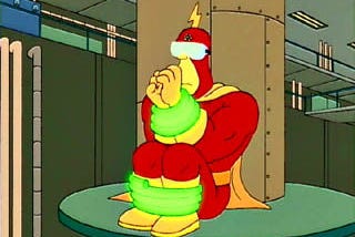 Radioactive man tied to a pole with goggles, about to scream ‘my eyes! The goggles do nothing!’ From The Simpsons