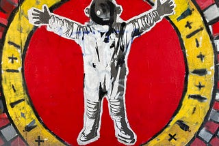 Picture of a mural featuring an astronaut surrounded by a circle.