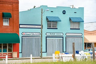 Store boarded up with hurricane shutters